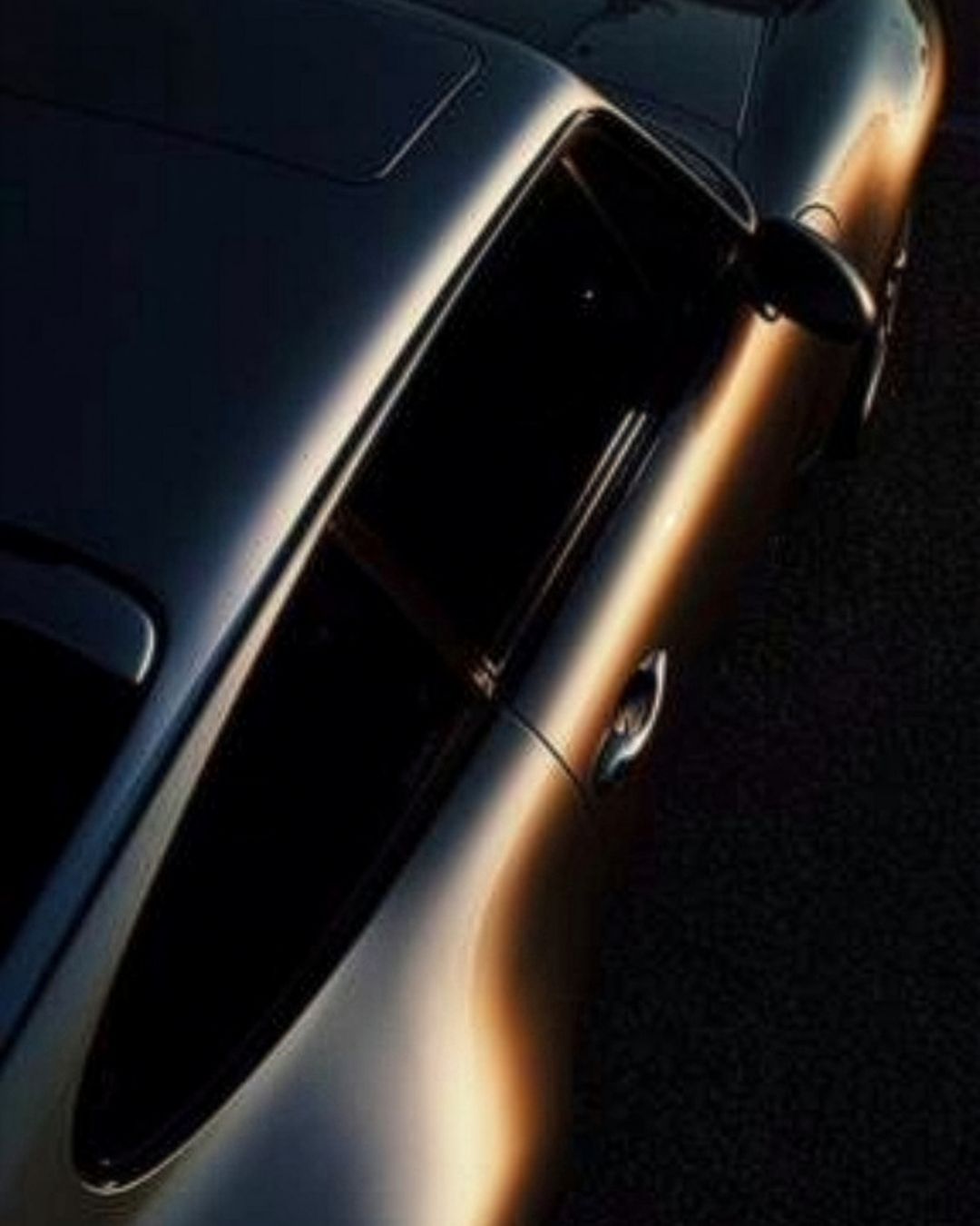 Car body detail with side lighting