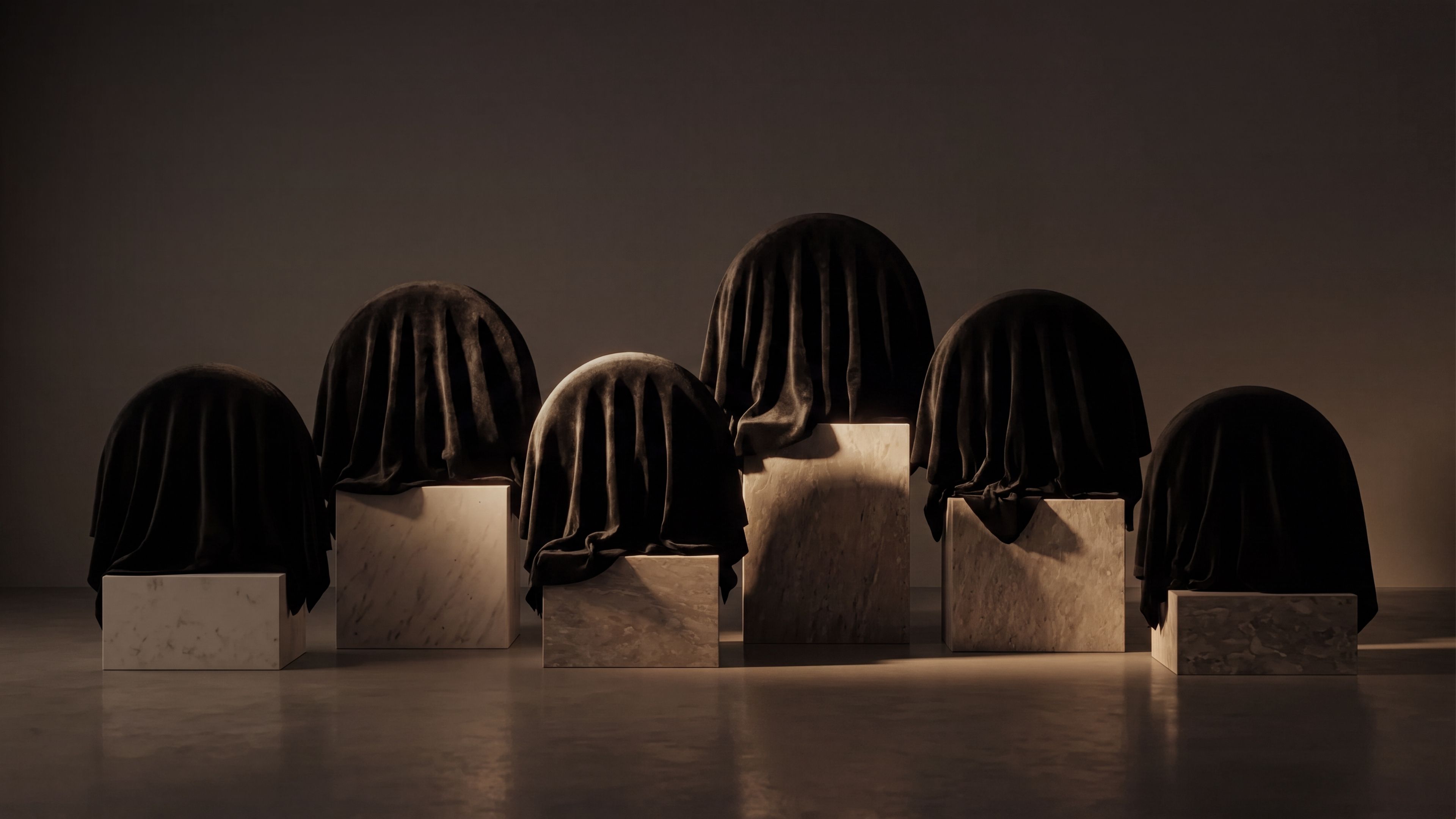 Covered objects on stone pedestals